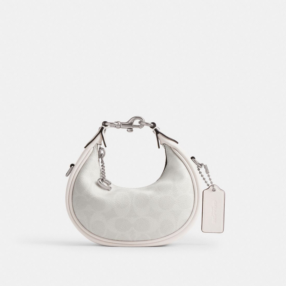Coach Jonie Bag In Signature Canvas available now at Orland Square