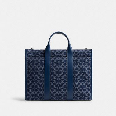 Coach Wesley Tote In Signature Canvas available now at