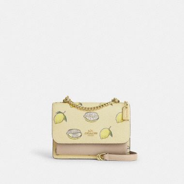 Coach Outlet Slim Crossbody Bag In Signature Canvas With