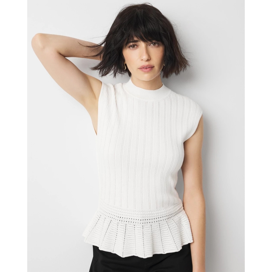 Mock Neck Peplum Sweater available now at Sugarloaf Mills®