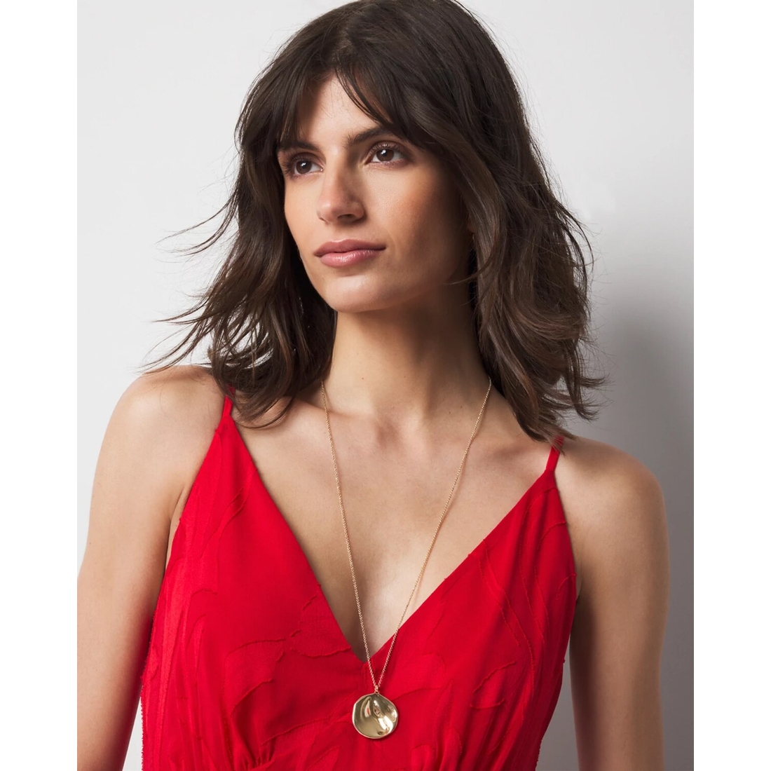 Gold Hammered Disc Pendant available now at Briarwood Mall