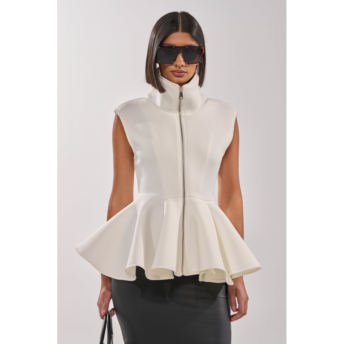 Lottie Neoprene Peplum Vest available now at Potomac Mills®