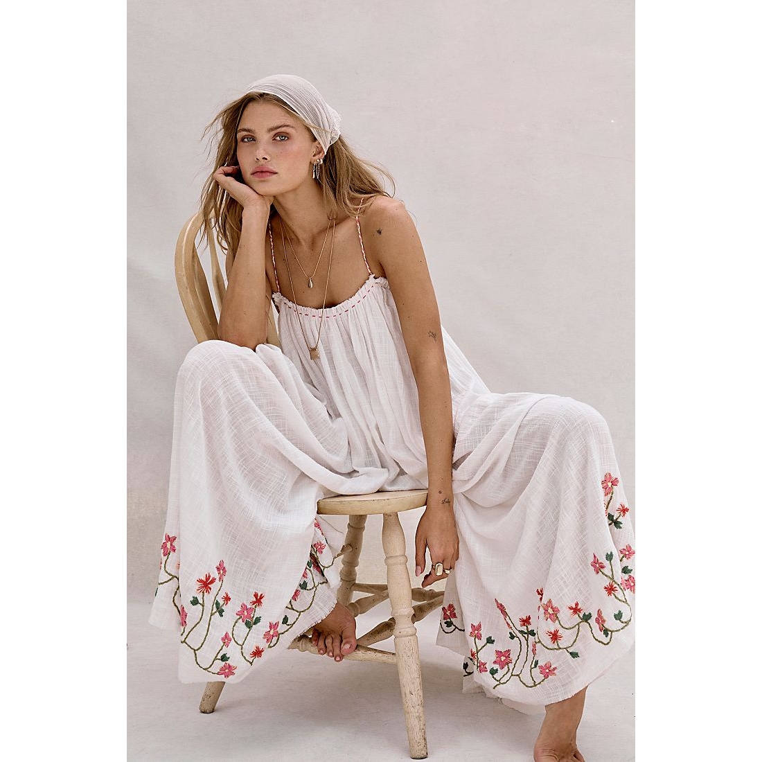 Raffia Blooms Jumpsuit available now at The Galleria™