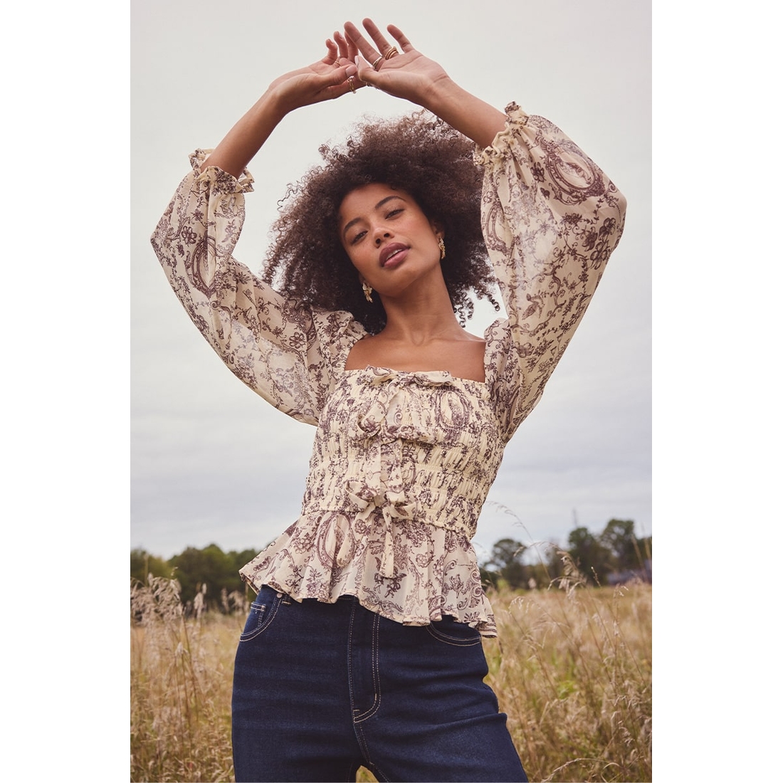 Ana Long Sleeve Smocked Top available now at Cordova Mall